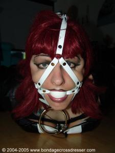 www.bondagecrossdresser.com - Hogtied in pink Rope thumbnail