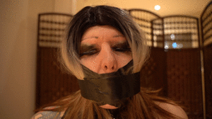 www.bondagecrossdresser.com - Chairbound with Tape and Masturbator thumbnail