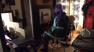 www.bondagecrossdresser.com - Rubber Girl on a Chair thumbnail